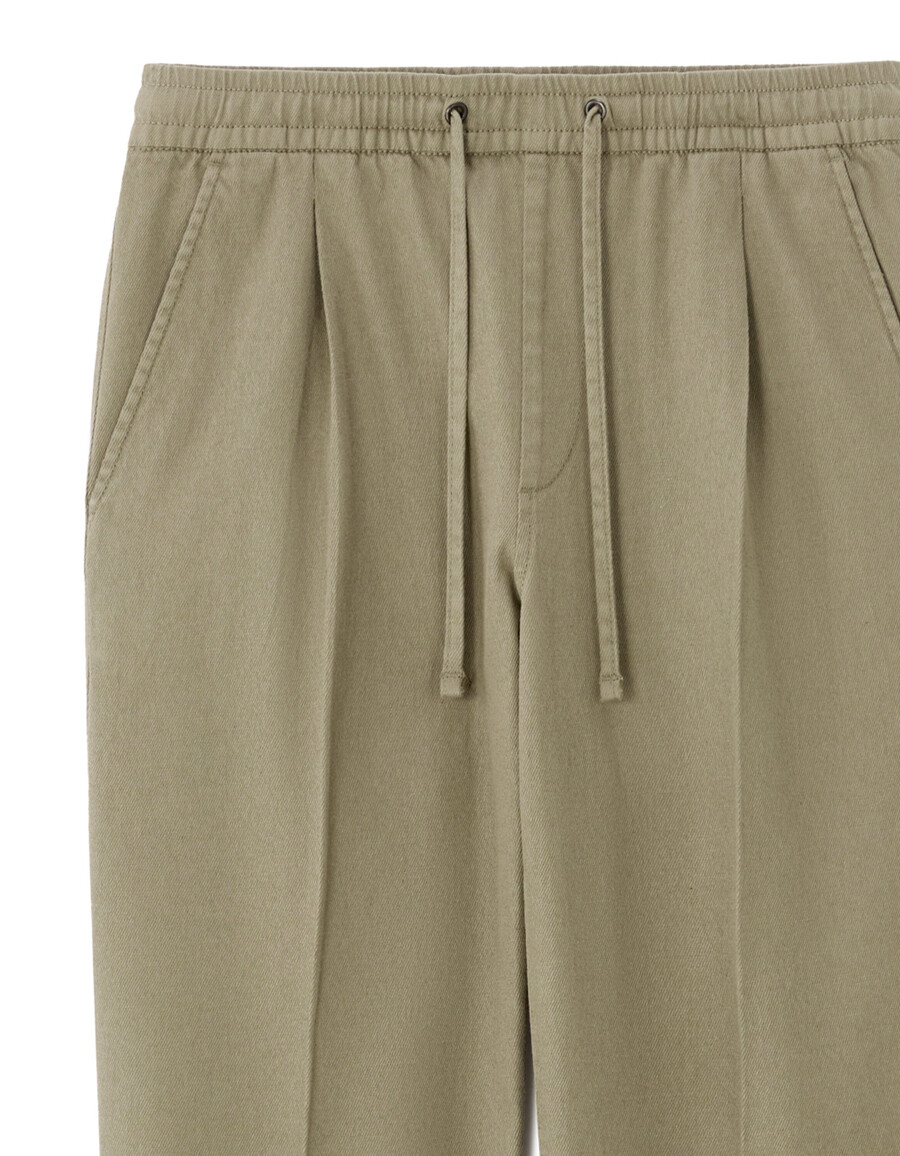 stretchiga bomulls- och linnebyxor med smal passform