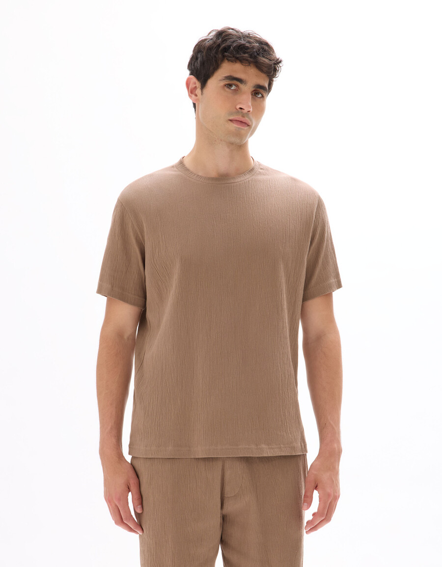 t-shirt med rund hals och veck