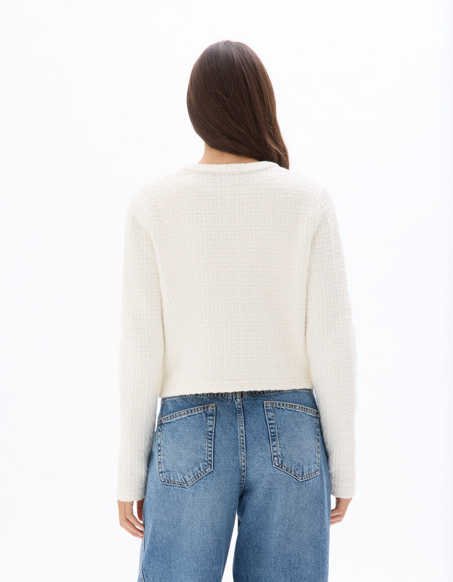 texturerad stickad jacka